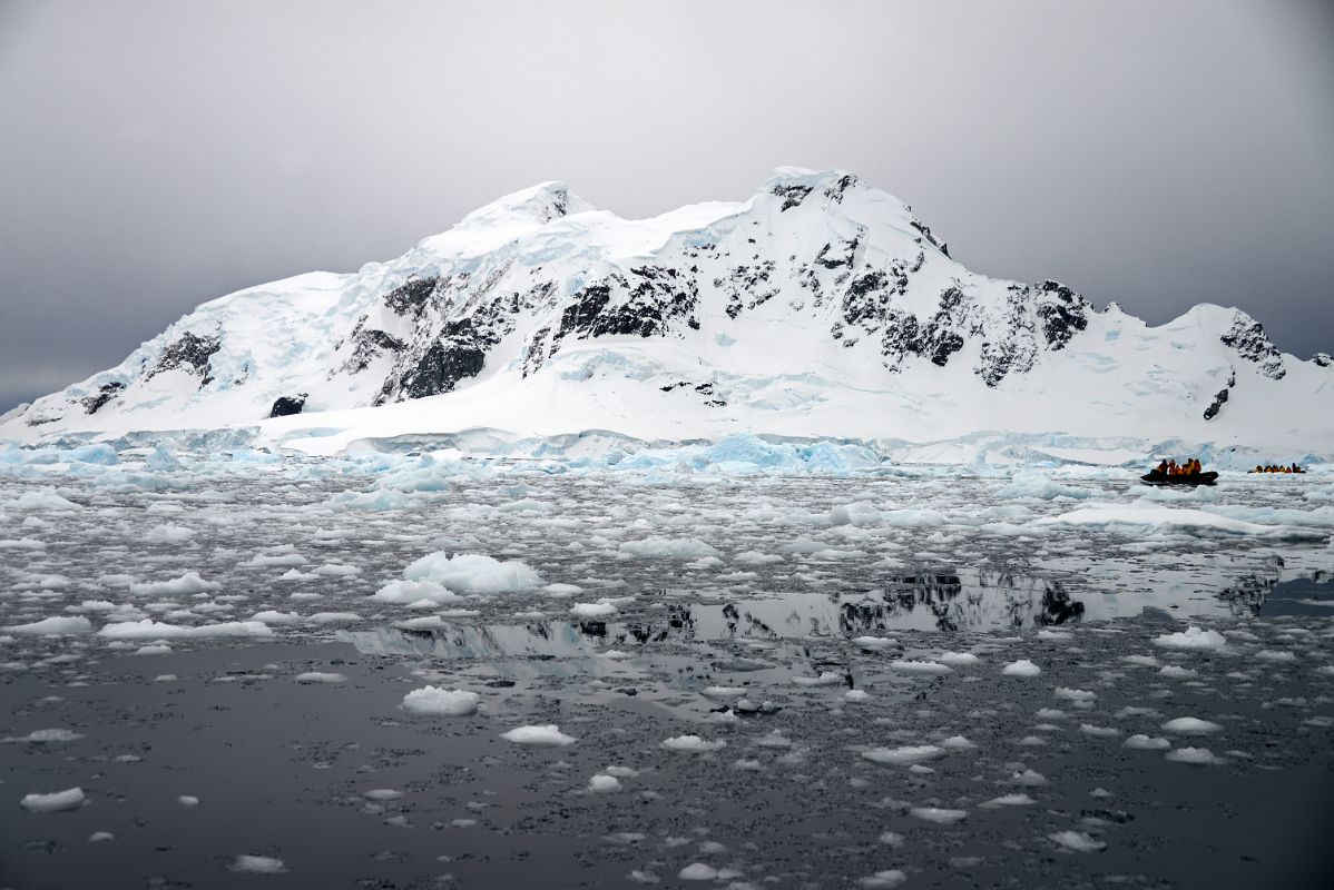 10A Zodiacs Are Dwarfed by The Mountains On Bryde Island In Paradise Harbour On Quark Expeditions Antarctica Cruise